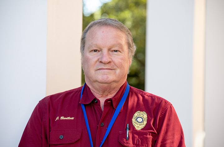 Chief of Campus Safety, Jimmy Bartlett smiles for the camera