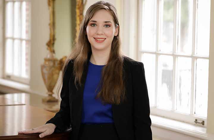 Kimberly Wragg stands in Burden Parlor.