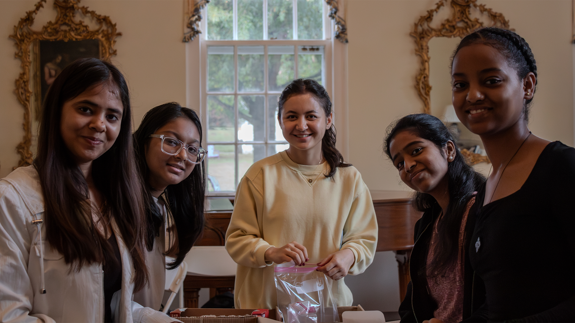 Students posing for photo at a community service event