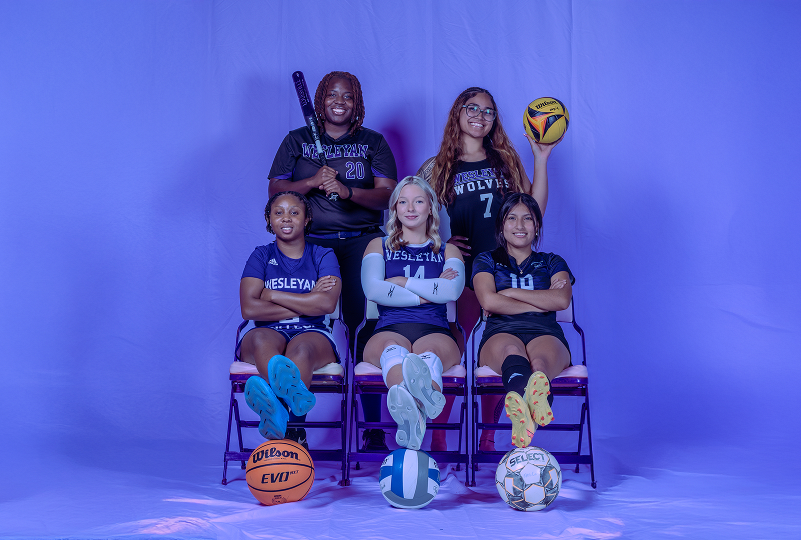 NAIA Group Photo Photo of 5 student athletes, one from each of the major sports the college offers.