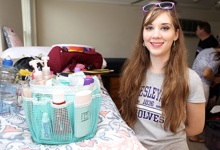 Student unpacking to move in the dorms.