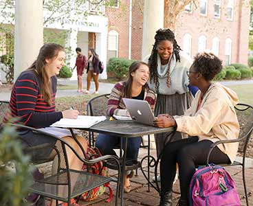 Students outside during a study session.