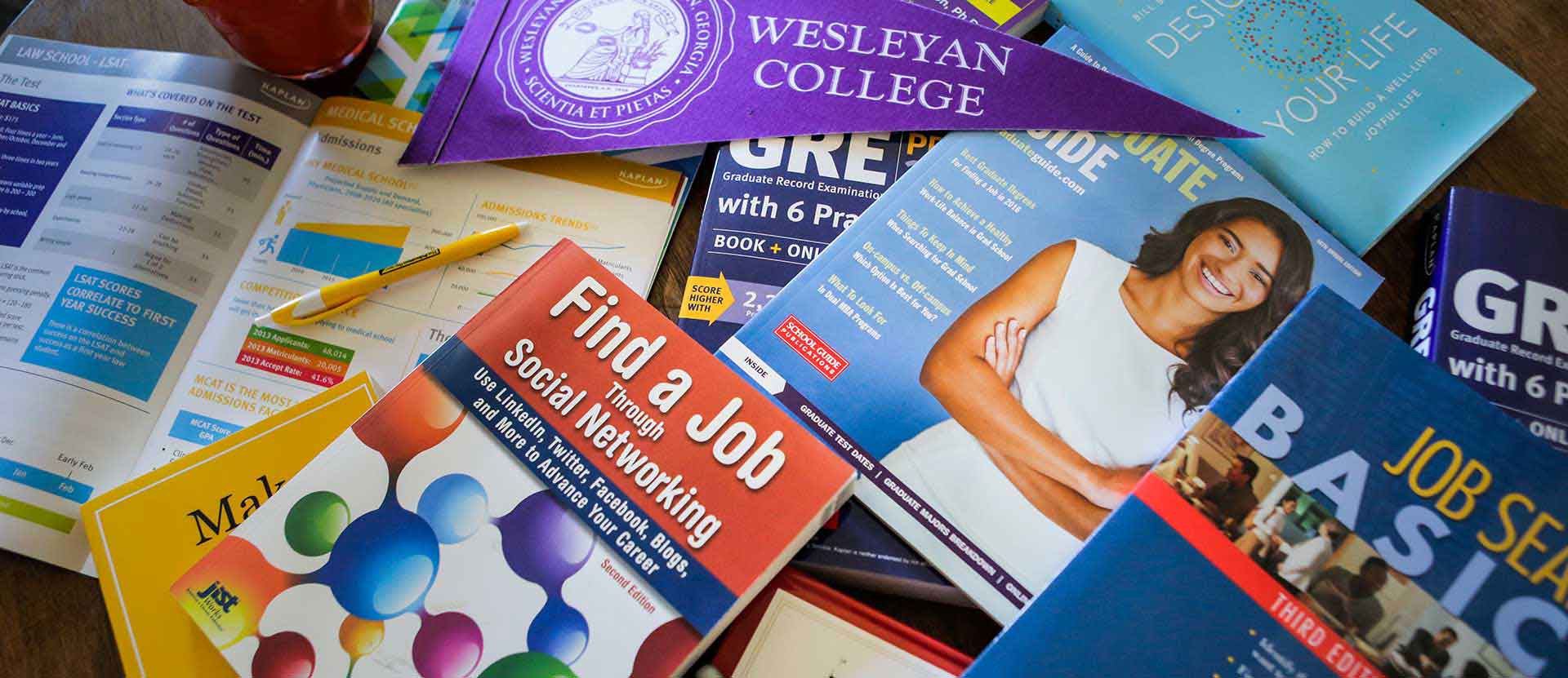 Pile of books scattered on table