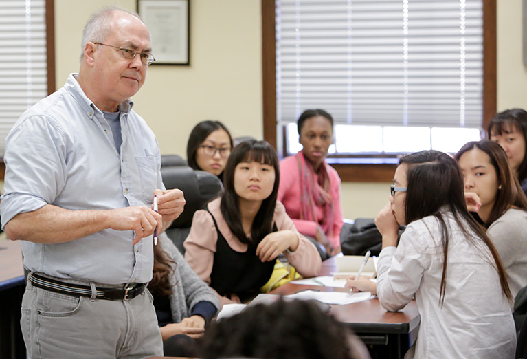 Communication class discusses social media strategies for communicating.