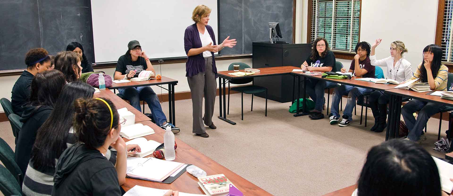 Students in the classroom listening to Political Science professor