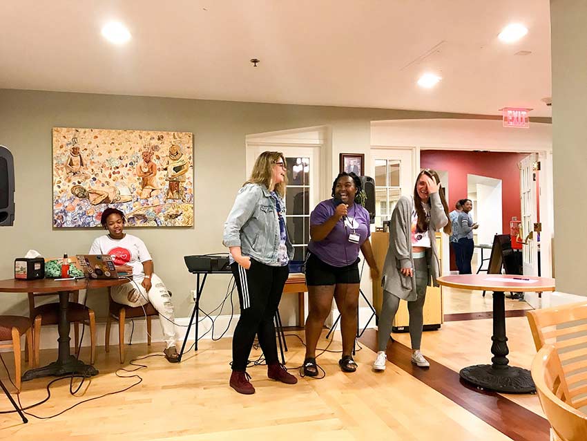 Students sing during Pup Night.